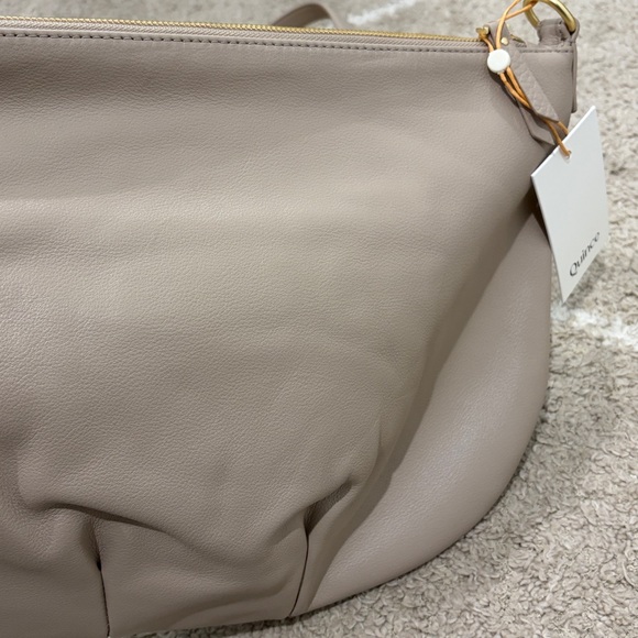 Quince Italian Leather Convertible Crescent
Shoulder Bag in Taupe